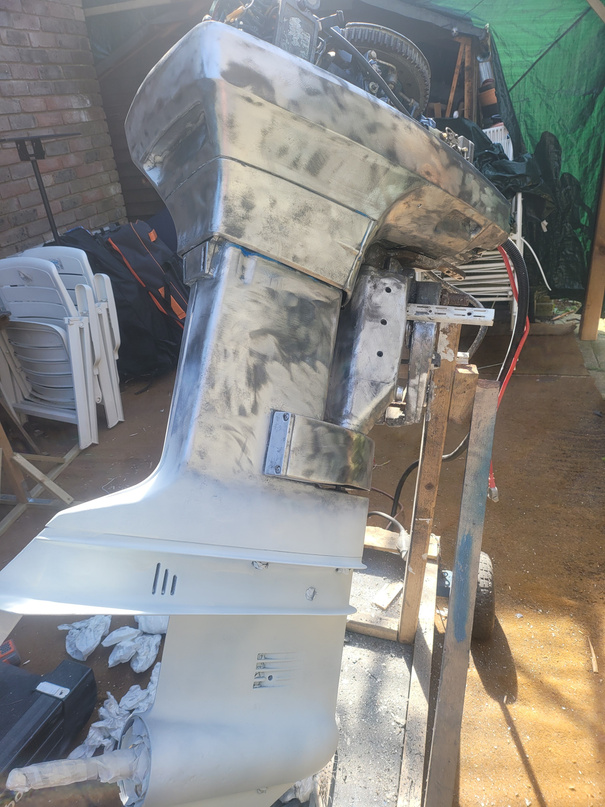 Outboard casings sanded down to bare primer, ready for paint