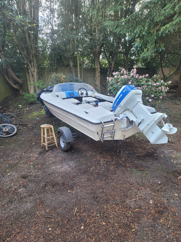 The finished boat after restoration &mdash; freshly painted and ready to launch