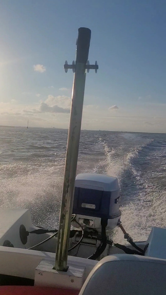 The boat running on the water &mdash; wake behind the transom