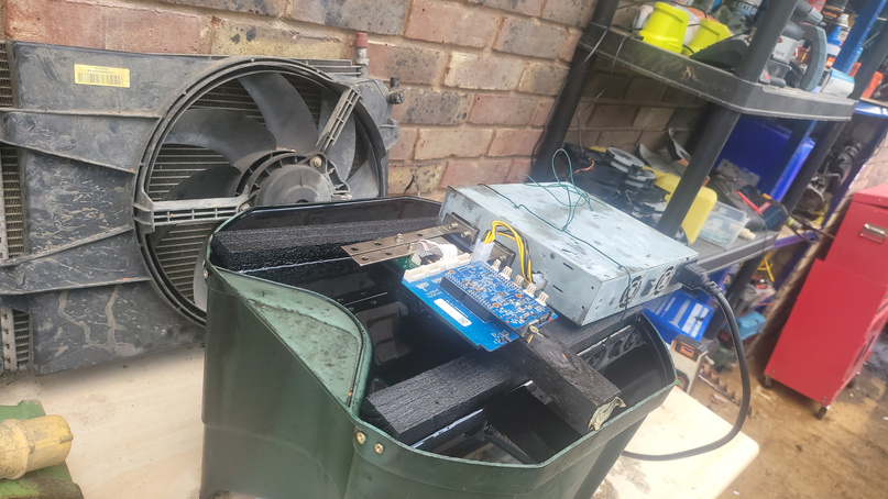 Early mining hardware experiment &mdash; radiator, custom PCB and electronics in the home workshop