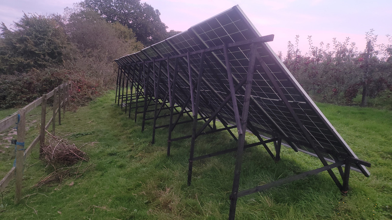 Row of ground-mount panels on the steel A-frame structure